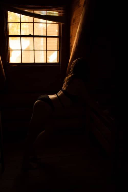 Woman by a window